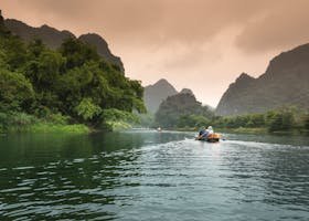 People Riding a Boat